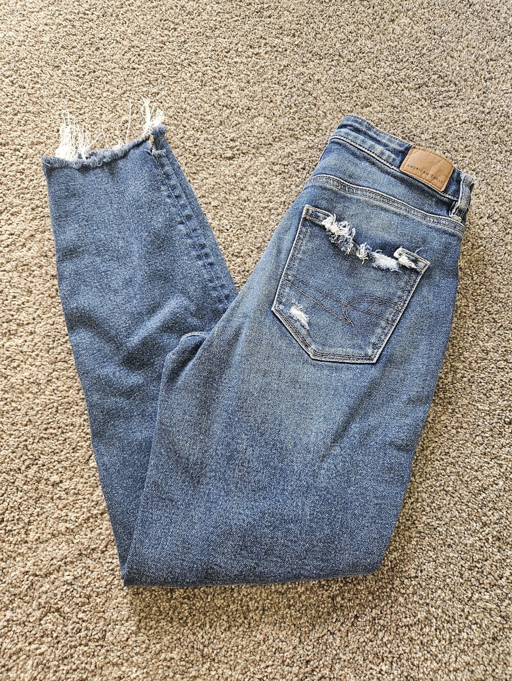 American Eagle High Rise Ripped Frayed Jeans Size 4 Regular